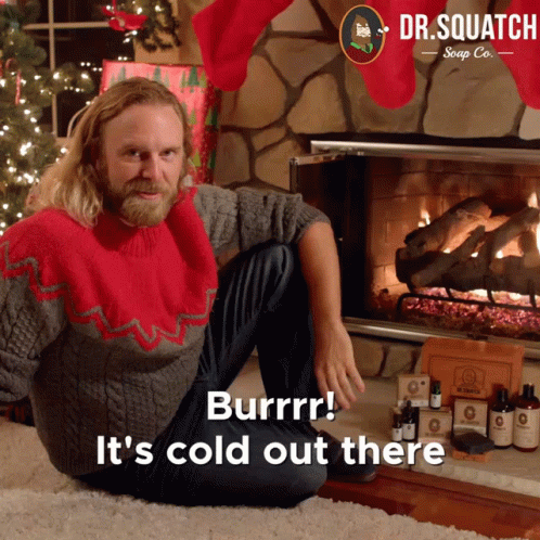 Man In Red Sweater By Fireplace GIF