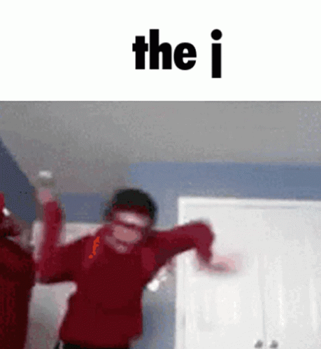 Man in Red Sweater Dancing The I