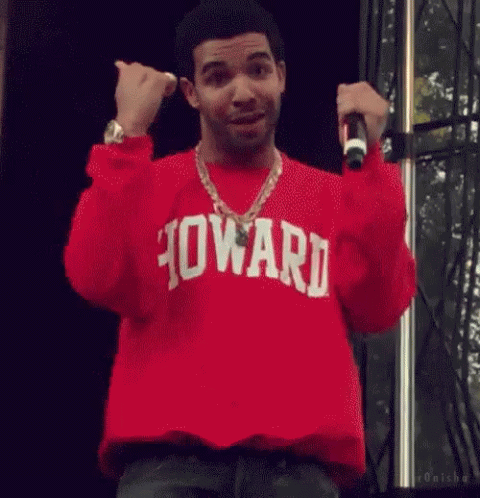 Man In Red Sweater Holding Microphone GIF
