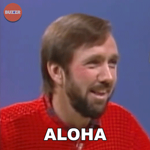 Man in Red Sweater Saying Aloha