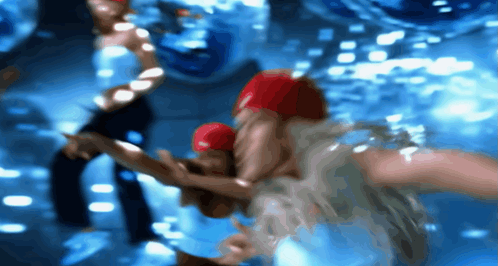 Man in Red Swim Cap Swimming