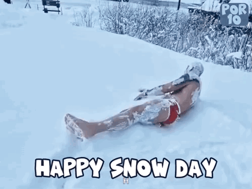Man in Red Swimsuit Lying in Snow
