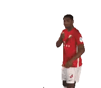 Man in Red T-Mobile Shirt and White Shorts