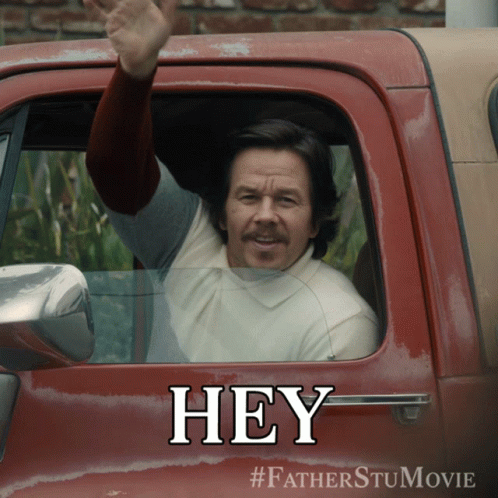 Man in Red Truck Saying Hey
