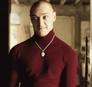Man in Red Turtleneck and Necklace with Pendant