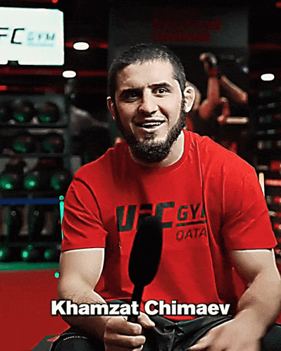 Man in Red UFC Qatar Shirt
