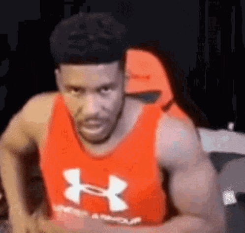 Man in Red Under Armour Tank Top