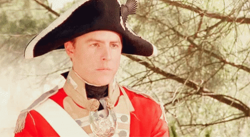 Man In Red Uniform With Black Hat GIF