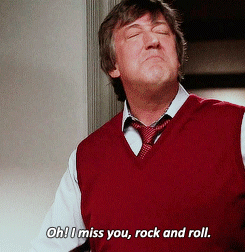 Man in Red Vest and Tie Saying Oh I Miss You Rock and Roll