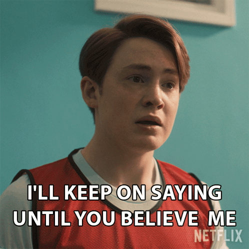 Man in Red Vest Saying I'll Keep On Saying Until You Believe Me