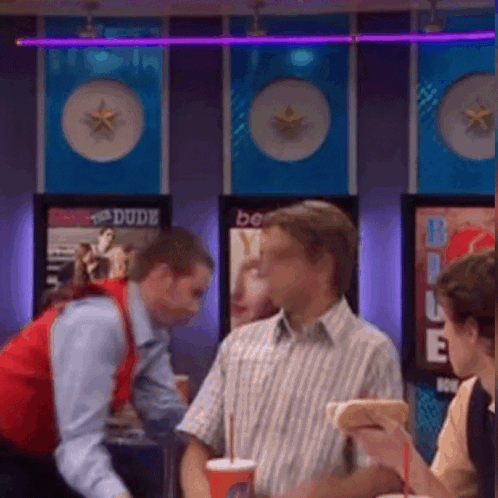 Man in Red Vest Talking