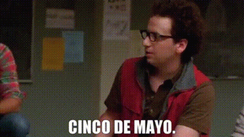 Man in Red Vest Talking Cinco De Mayo