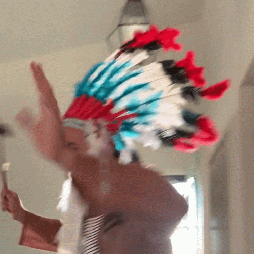 Man In Red White And Blue Headdress GIF