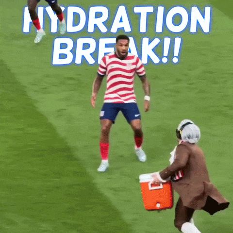 Man in Red White Blue Shirt Running with Cooler