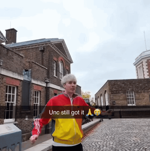 Man in Red-Yellow Jacket UNC Still Got It