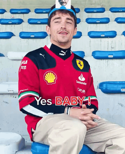 Man in Red Yes Baby Shirt in Stadium