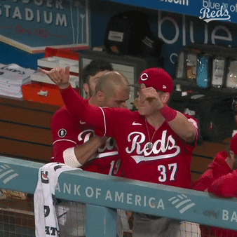 Man In Reds Jersey Giving Thumbs Up GIF