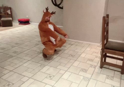 Man in Reindeer Costume Kneeling