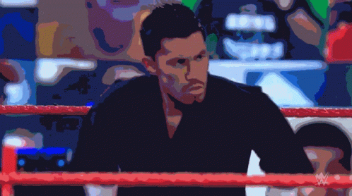 Man in Ring with W Logo