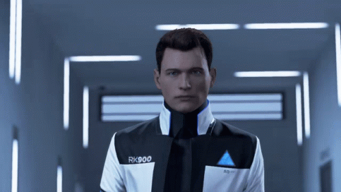 Man in Rk900 Jacket Standing in Dark Hallway