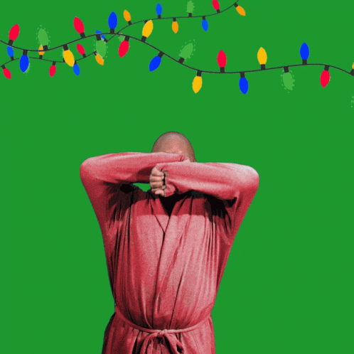 Man in Robe Flexing with Christmas Lights Yawn