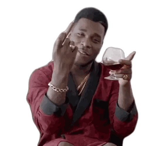 Man in Robe Holding Cognac and Flipping Off