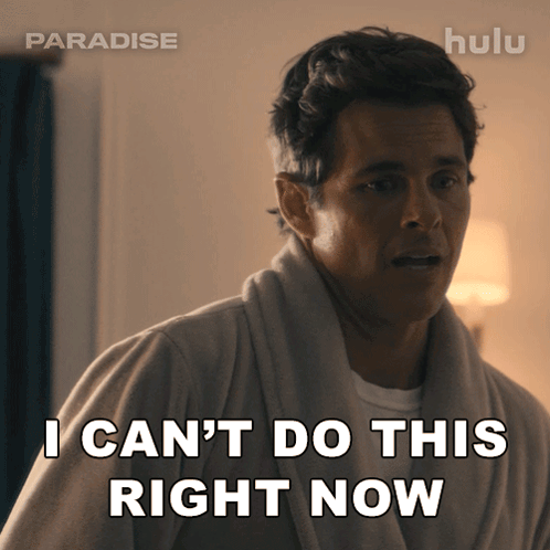 Man in Robe Saying I Can't Do This Right Now