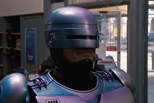 Man in Robot Costume With Helmet and Mask