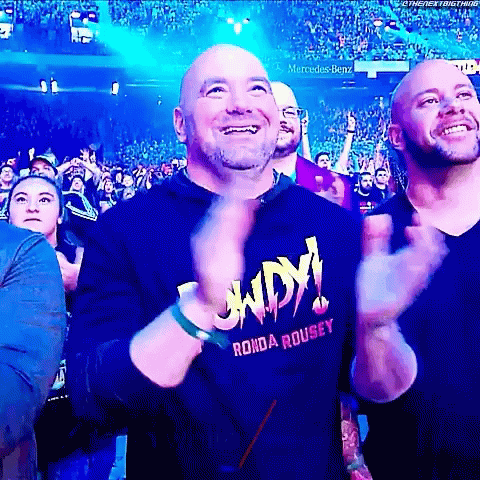 Man In Ronda Rousey Shirt Applauds In Crowd GIF
