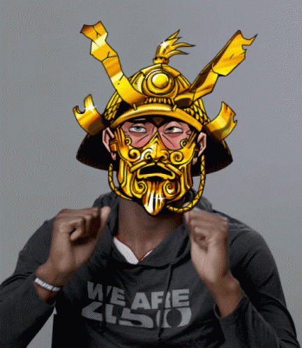 Man in Samurai Mask and Hoodie Saying we afe zlso