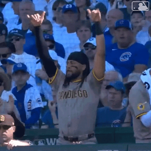 Man in San Diego Jersey Arms Up