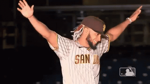 Man in San Diego Jersey Standing with Arms Out
