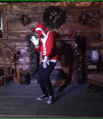 Man In Santa Costume Sitting In Chair GIF
