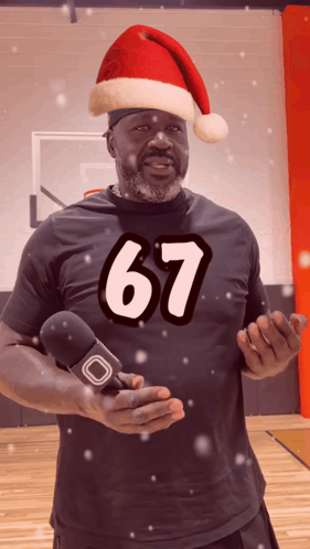 Man in Santa Hat and 67 Shirt