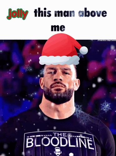 Man In Santa Hat And Bloodline Shirt GIF
