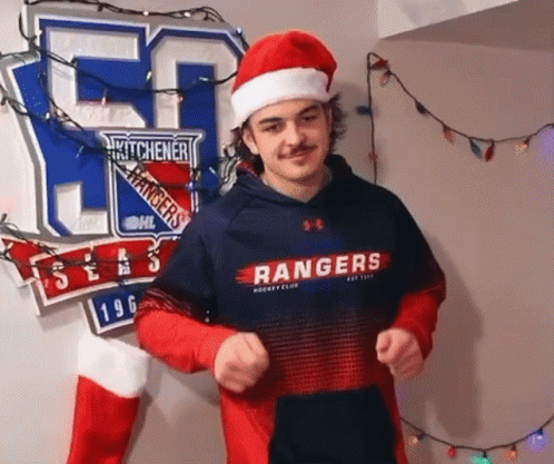 Man in Santa Hat and Rangers Shirt