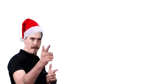 Man in Santa Hat Pointing at Candy Cane