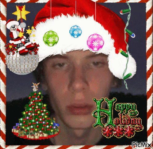 Man in Santa Hat Surrounded by Christmas Decorations and Tree