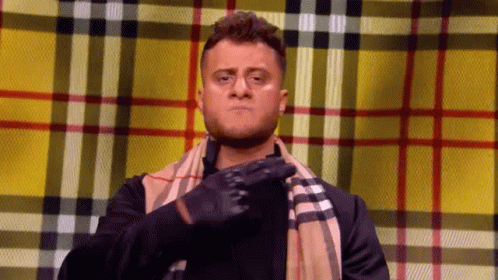 Man in Scarf and Black Gloves, Plaid Cloth