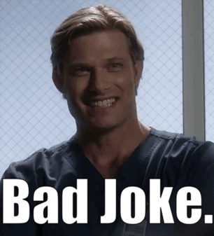 Man in Scrub Top Smiling With Bad Joke