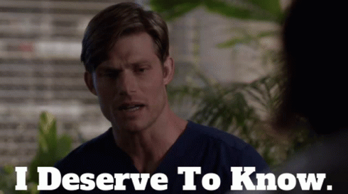 Man in Scrubs Saying I Deserve to Know in Front of Plant
