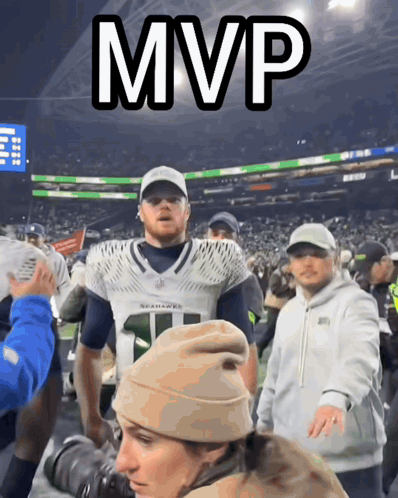 Man In Seahawks Jersey In Front Of Crowd GIF
