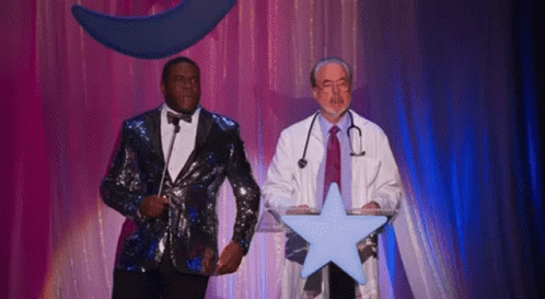 Man in Sequined Suit Next to Man in Lab Coat Holding Star