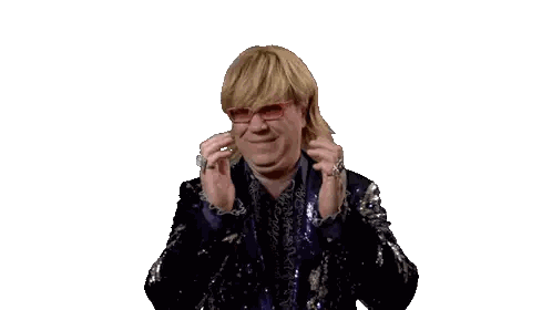Man in Sequined Suit Talking on Phone