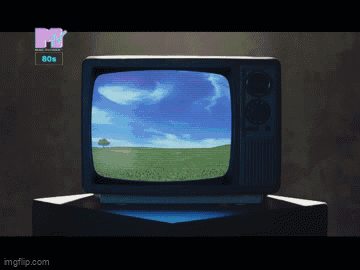 Man In Shirt And Tie On Blue Couch GIF