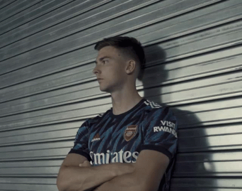 Man in Shirt Saying Emirates