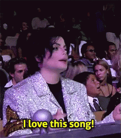 Man in Silver Jacket Saying I Love This Song