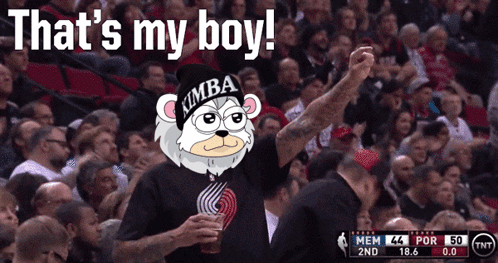 Man In Simba Hat In Crowd GIF