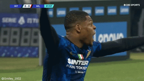 Man in Sinter Fan Token Jersey Celebrates