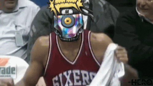 Man In Sixers Jersey Being Held GIF